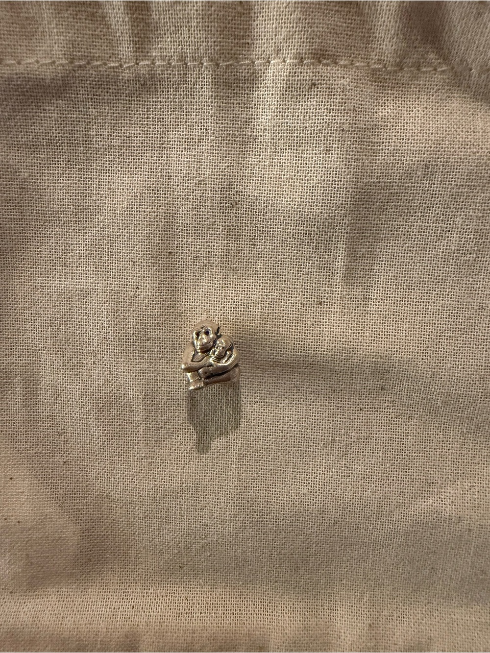 Authentic retired Pandora sterling silver monkey holding baby monkey charm